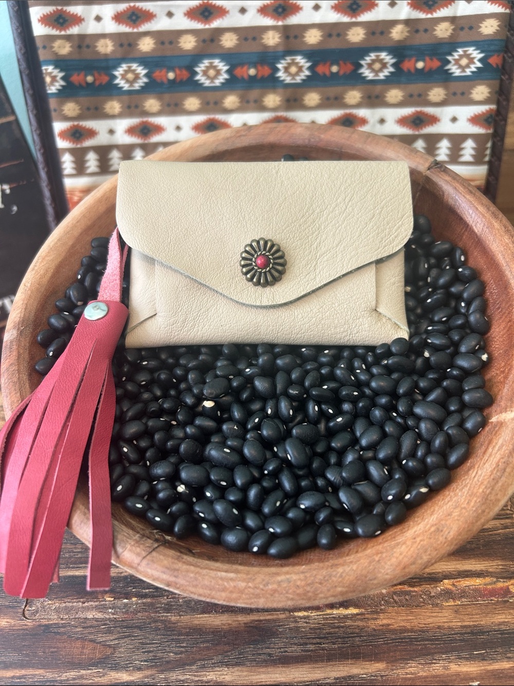 Cream Leather Clutch with Red Tassel and Concho Accent